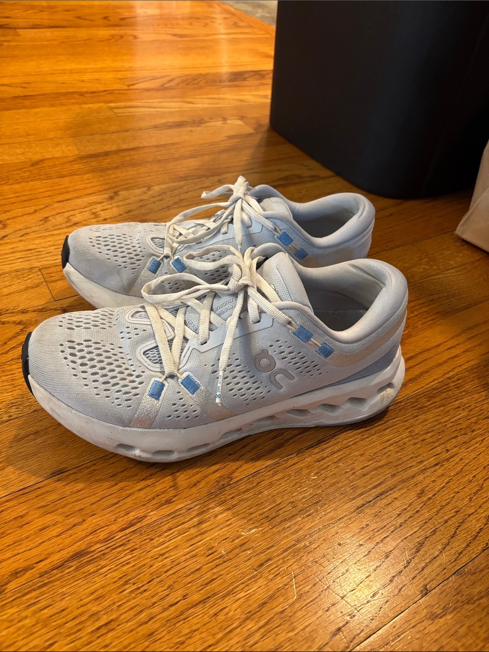 On Running Women’s Sneakers in Light Gray with Blue Accents